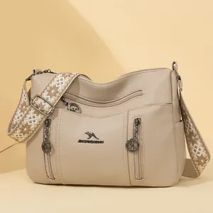 Elegant apricot large-capacity crossbody bag with wide embroidered strap for stylish women