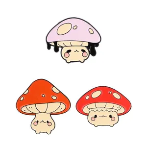 Set of three cute anthropomorphic mushroom metal pins for backpacks in pink, orange, and red