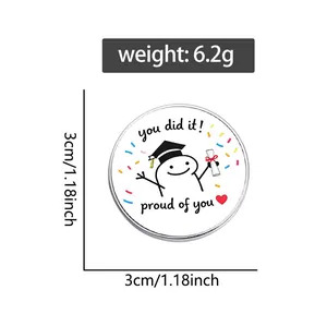 Cute cartoon graduation enamel pin badge with 'You did it' text and size measurement.