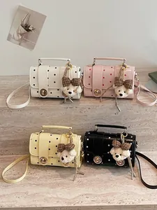 Set of retro polka dot crossbody bags in four colors with cute teddy bear charms.