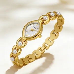 Orologio da donna elegante in oro con accenti di perle e design vintage di lusso