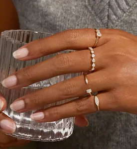 Detailed view of elegant gold-plated sterling silver rings with sparkling cubic zirconia