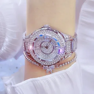 Luxury silver women's watch with full rhinestone inlay and matching butterfly bracelet
