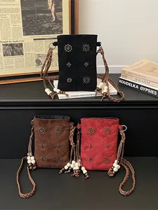 Vintage velvet crossbody phone bag with beaded accents and braided strap