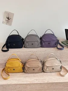 Colección de seis bolsos bandolera de nailon de colores para la moda casual diaria