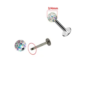 Macro view of G23 titanium labret stud with iridescent crystal ball and external thread