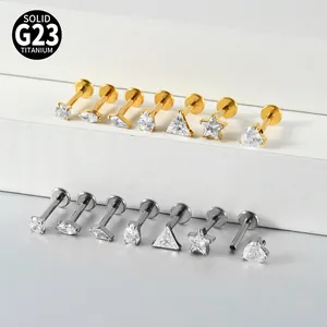 G23 titanium labret studs with zircon in heart and star shapes, internally threaded.