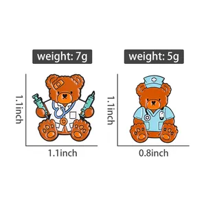 Detail of teddy bear doctor and nurse enamel pins showing size and weight specifications