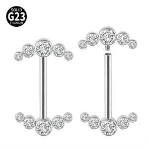 Detail showing internally threaded G23 titanium nipple rings with CZ arc
