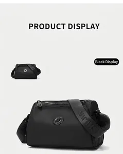 Detailed view of the lightweight waterproof black nylon dumpling crossbody bag showing texture