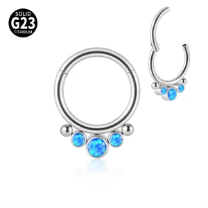 High-quality G23 titanium nose ring featuring three blue opal stones and hinged clicker design