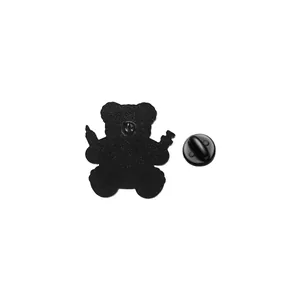 Detailed back view of a black metal teddy bear lapel pin with rubber clutch