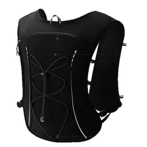 Rear detail view of black running vest backpack with reflective strips and bungee cord