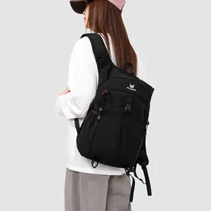 Asian model wearing a large black multi-functional outdoor backpack for hiking and travel.
