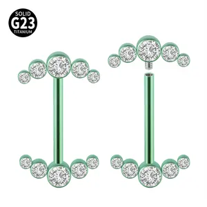 Detail view of G23 titanium nipple ring showing internal thread and green plating.