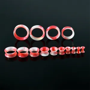 Set di tunnel per orecchie in silicone marmorizzato rosso e bianco in varie misure per piercing