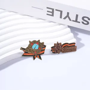 Detailed view of vintage Soviet-style red star brooches with ribbons on display
