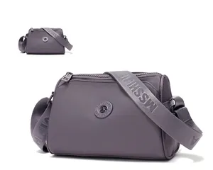 Stylish purple waterproof nylon crossbody bag for casual daily commute and travel