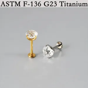 Macro detail of ASTM F-136 G23 titanium labret studs with sparkling clear zirconia