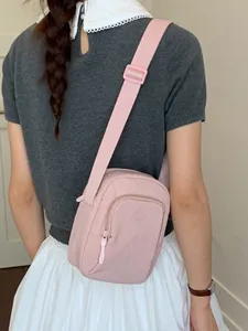 Stilvolle rosa leichte Mini-Umhängetasche für Damen, perfekt als Handytasche geeignet