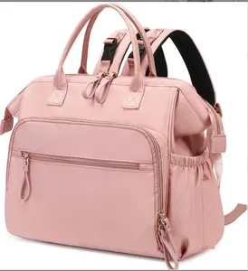 Front view of pink waterproof multi-functional diaper bag backpack for baby travel