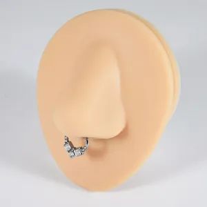 Stainless steel segmented septum ring with square and round white zircons on nose model