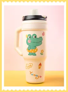 Close-up of cute cartoon crocodile and letter stickers applied on a cream tumbler