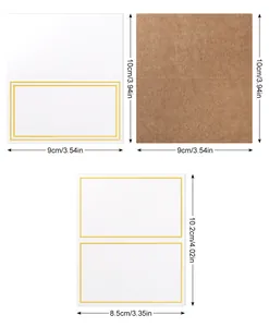 Detailed dimensions of wedding place cards in white with gold border and kraft paper