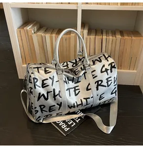 Fashionable silver graffiti duffel bag for gym and travel with large storage capacity