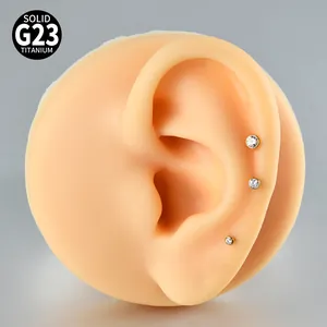 G23 titanium internal thread labret studs with round cubic zirconia on ear model