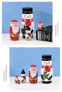 Handmade Christmas wooden nesting dolls featuring Santa Claus and Snowman for home decor