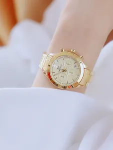 Elegante reloj dorado para mujer con correa de acero y esfera multifuncional