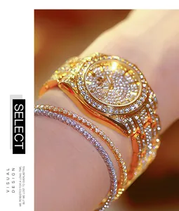 Close-up detail of a luxury gold-toned women's watch with full rhinestone inlay