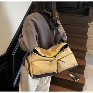 Versatile large multi-pocket khaki travel gym bag for men and women in a casual style