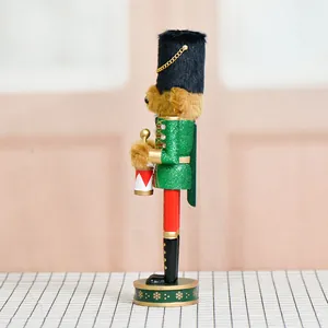 Cascanueces oso tamborilero clásico de madera de 30cm con uniforme verde brillante y fino