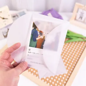 Detail shot of a translucent vellum envelope showing its semi-transparent texture