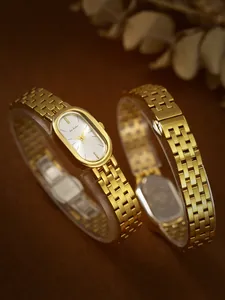 Reloj vintage para mujer en acero inoxidable dorado con esfera ovalada y brazalete