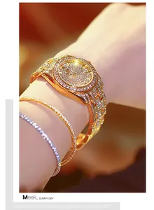 Detailed close-up showing a luxury gold BS women watch with full diamond crystal inlay