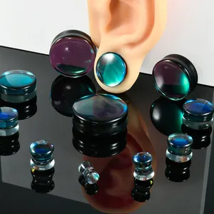 Professional black AB glass ear gauges and solid expanders for body piercing jewelry.