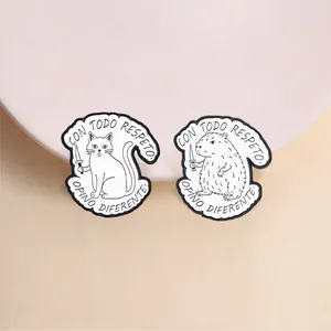 Funny black and white cat and capybara metal enamel pins with Spanish quote engravings