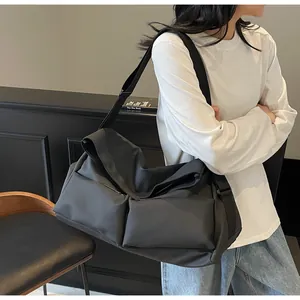 Professional black multi-pocket crossbody sports bag for fitness and travel use
