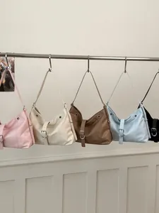 Stylish underarm hobo tote bags for women available in a variety of soft pastel colors