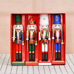 Set van 4 gestreepte houten notenkraker poppen van 18 cm in een rode geschenkverpakking