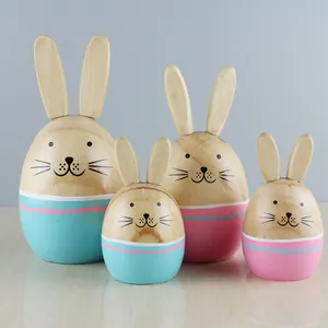 Lot de quatre figurines de lapins en bois rustique fait main pour décoration intérieure