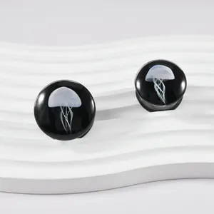 Glas-Ohrstöpsel mit Quallen-Design und schwarzer Basis