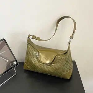 Stylish olive green woven underarm shoulder bag for women, trendy daily commuter handbag.