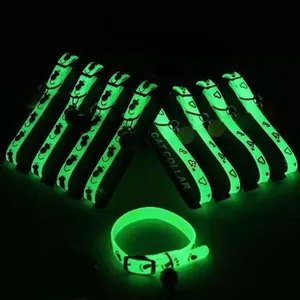 Glow-in-the-dark green silicone pet collars with bell and cat prints for night safety