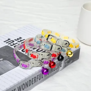 Detail of luminous silicone pet collars with bells in various colors for small dogs and cats