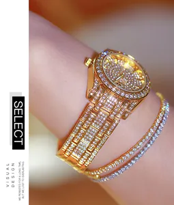 Close-up of a luxurious gold-tone women's watch fully set with sparkling crystals