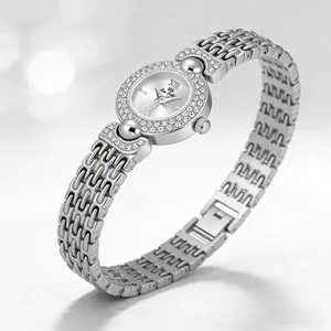 Elegant vintage silver watch for women featuring small diamond-encrusted bezel and band